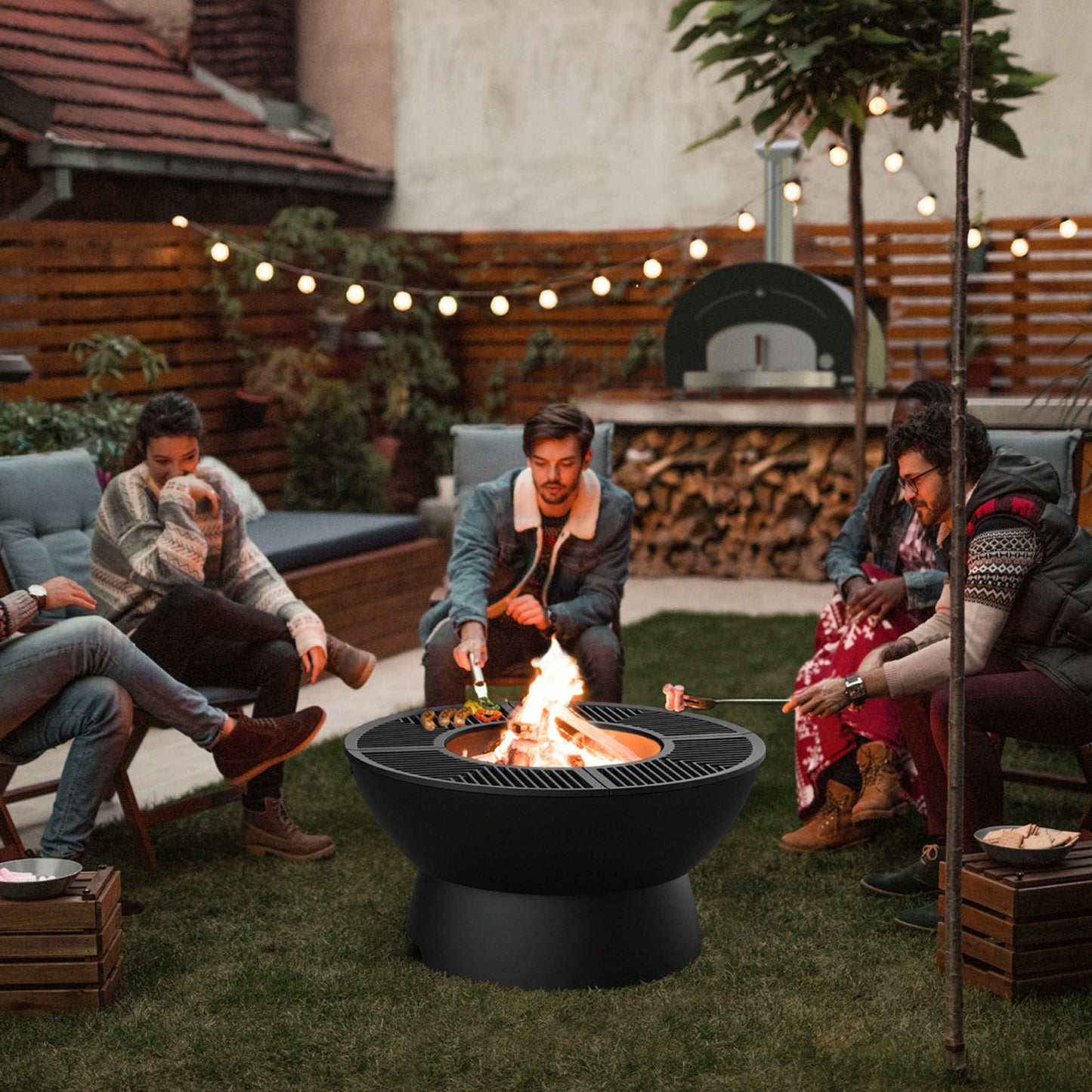 Meteor 38” Cast Iron Fire Pit with Low Base, Grill Grates, Griddle, and Soapstone Surfaces