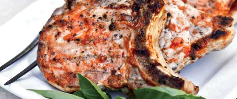 BOURBON GRILLED PORK CHOPS WITH PEACH BARBECUE SAUCE