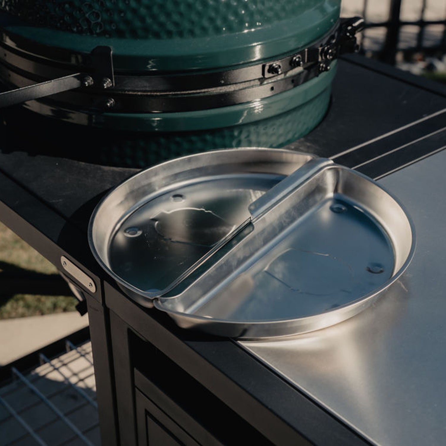 Stainless steel durable drip pans for big green egg on a white background